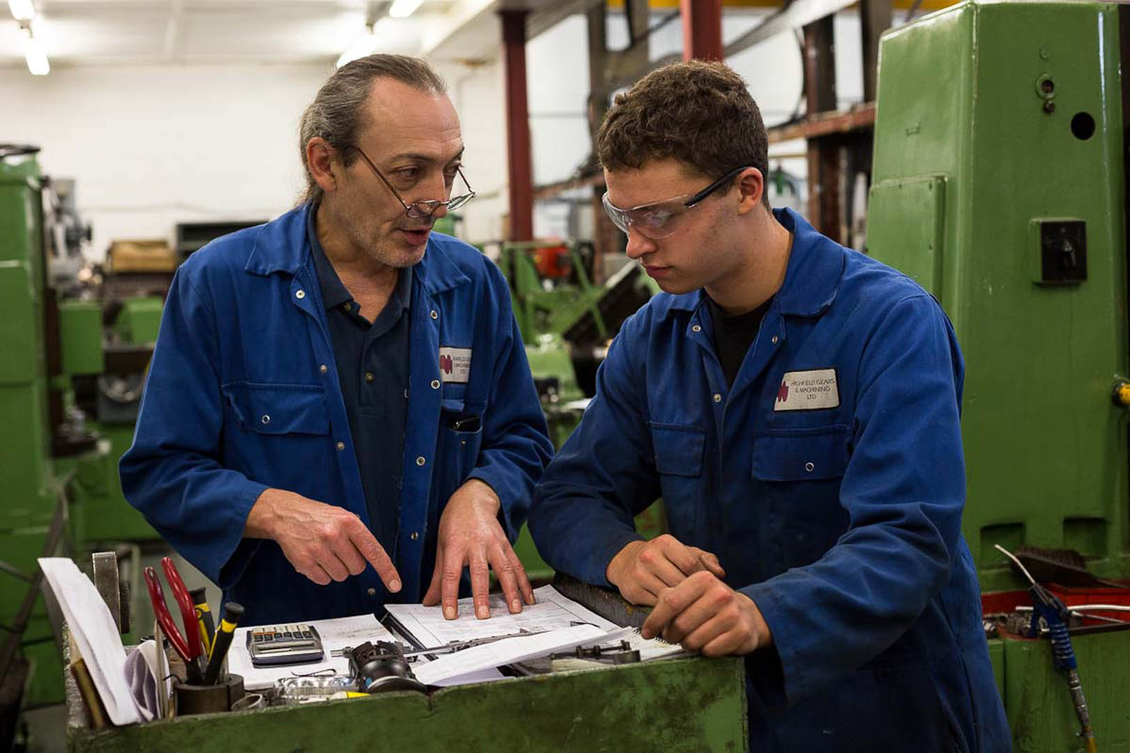 Highfield Gears Specialist showing a younger engineer the specifications